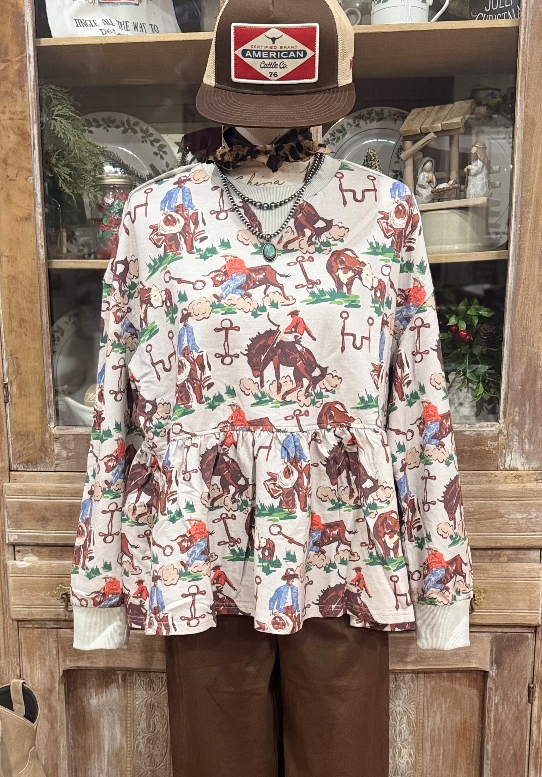 The Cowhand Ruffle Top